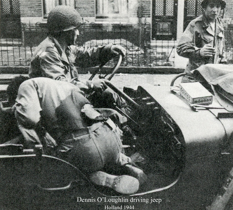 Dennis OLoughlin driving Staff Sergeant Herbert J. Buffalo Boy of D Company to the aide station.